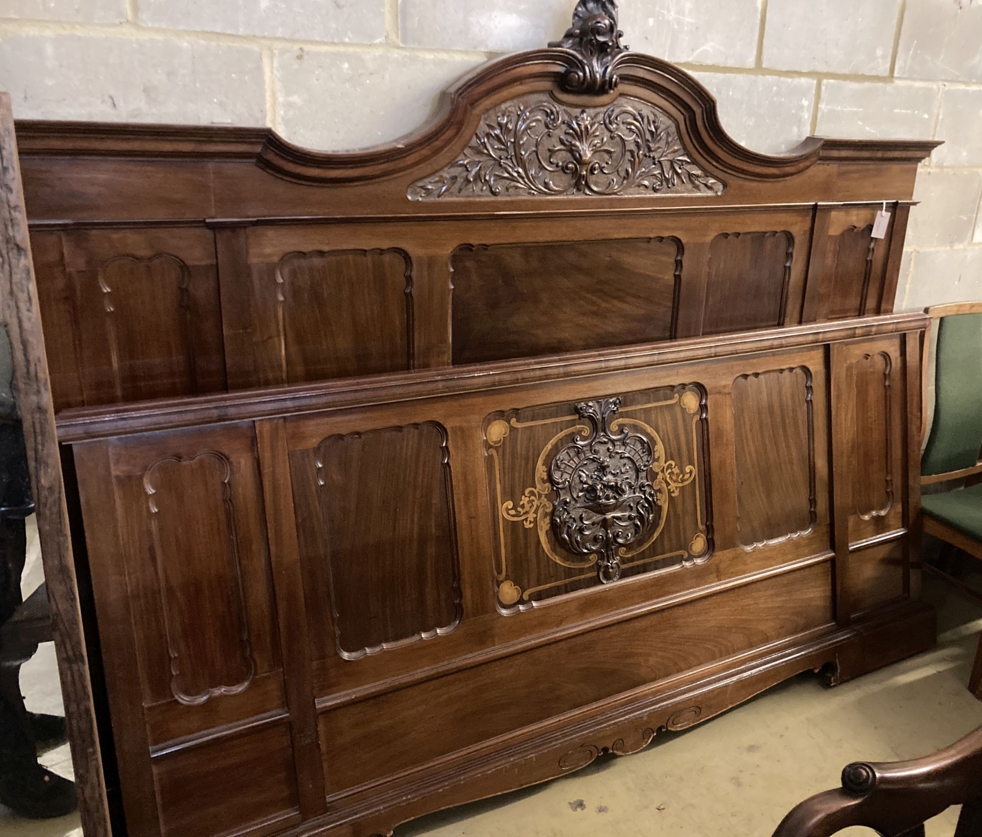 A large mahogany bedstead, width 220cm